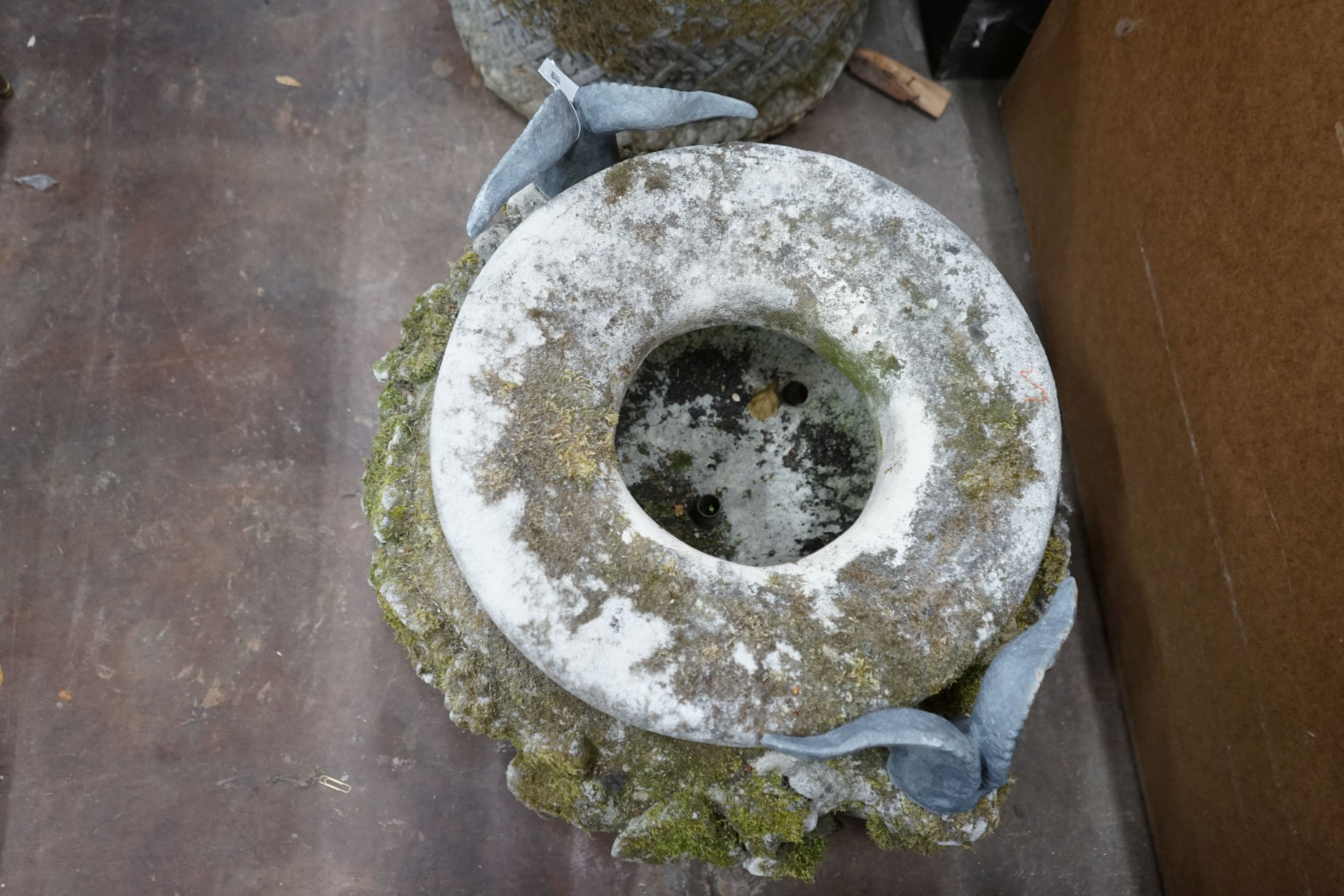A large circular reconstituted stone ram's head garden planter / fountain head, diameter 66cm, height 42cm